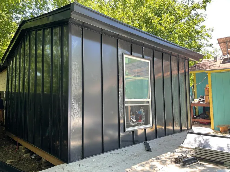 Black standing seam metal wall panels for Roof Inspection in EspaÃ±ola