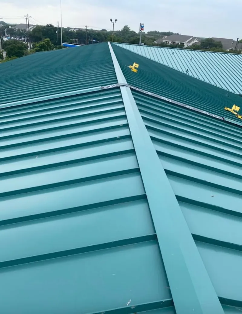 Green commercial metal roof ridge and valley for Metal Roof Repair in EspaÃ±ola